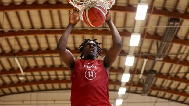 Alabama men's basketball center Charles Bediako slams down a dunk against Lithuania - Summer Foreign Tour - August, 2022
